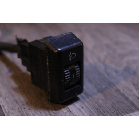bouton reglage hauteur de phare ssangyong musso 2005